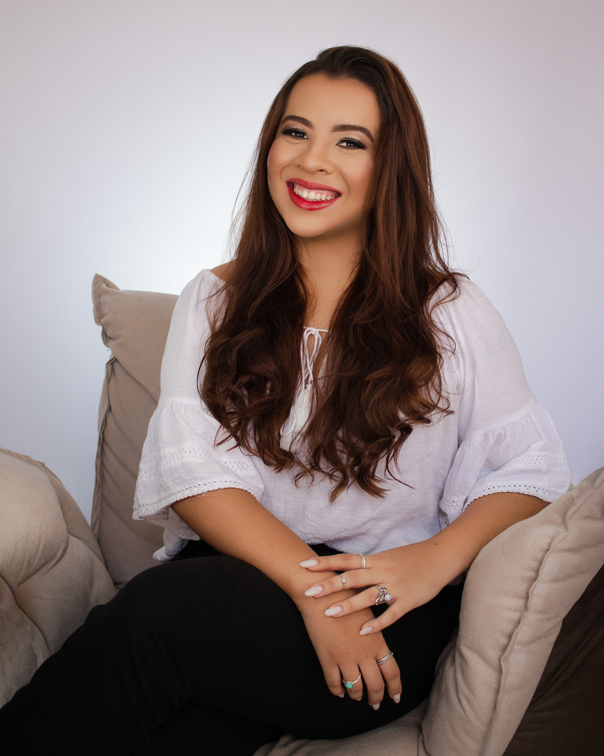 Woman in a White Blouse Smiling